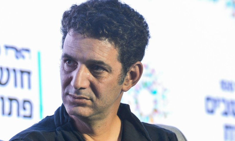 "בושה וחרפה": עיתונאי 'הארץ' נעצר; הקולגות תקפו