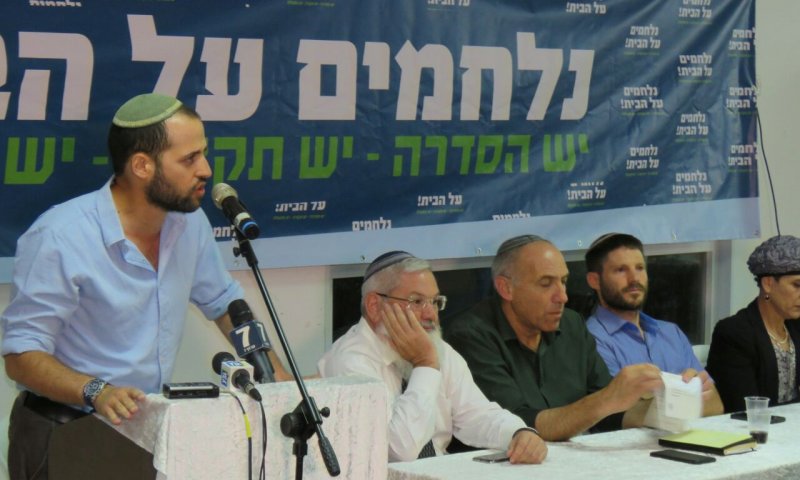 מהומה בעמונה: פעילים הורידו את בן דהן מהבמה