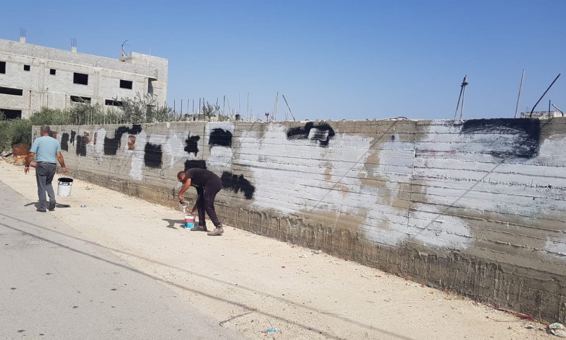 זו הרתעה: תושבי חווארה מחקו את צלבי הקרס