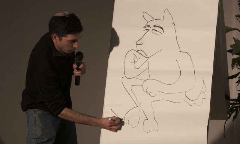 שי צ'רקה מרצה בציורים על כלב השמירה של הדמוקרטיה