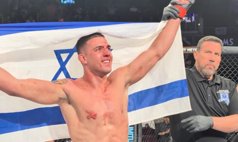 למרות הבוז: לוחם הMMA שמעון סמוטריצקי ניצח והניף את הדגל